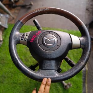 volante completo  de Mazda verisa 2010